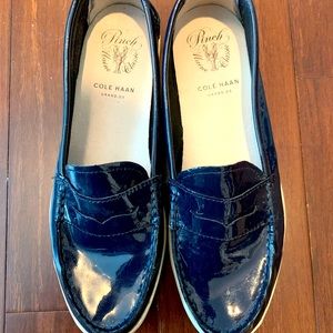 Cole Haan patent leather moccasins.
